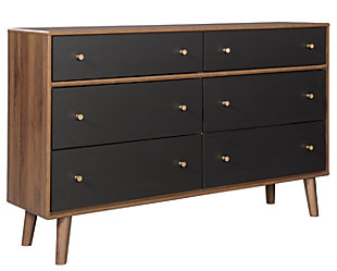With its ultra clean-lined profile, minimalist-chic appeal and distinctive splayed legs, the Daneston dresser has all the signature elements of high-end Scandinavian style: with a twist. A tantalizing two-tone finish blends replicated walnut grain with a matte black on the flush-mount drawer fronts. Six deep, smooth-gliding drawers are generously accommodating.Dresser only | Made of engineered wood (MDF/particleboard) | Two-tone finish (replicated walnut grain and matte gray) | Burnished goldtone hardware | 6 smooth-gliding drawers with faux linen lining | Safety is a top priority, clothing storage units are designed to meet the most current standard for stability, ASTM F 2057 (ASTM International) | Drawers extend out to accommodate maximum access to drawer interior while maintaining safety