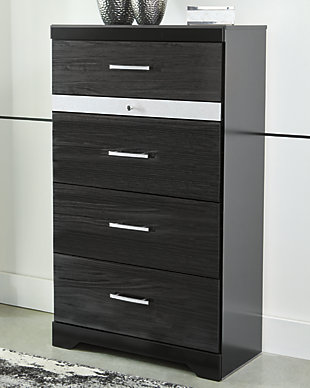 Starry, starry nights. Inspired by Hollywood glam, the richly styled Starberry chest of drawers steals the show in a simply stunning way. Its replicated walnut grain is enriched with a high-gloss black finish, made even more dramatic with chrome handles with faux crystals. A felt-bottom six-compartment jewelry drawer with silver glitter finish front accentuates the clean-lined, contemporary aesthetic.Made of engineered wood (MDF/particleboard) and decorative laminate | High gloss black finish with replicated straight silver walnut grain framed in black finish | Silvertone glitter accent | 4 smooth-gliding drawers plus felt-lined 6-compartment jewelry drawer | Chrome-tone hardware with faux crystals | Safety is a top priority, clothing storage units are designed to meet the most current standard for stability, ASTM F 2057 (ASTM International) | Drawers extend out to accommodate maximum access to drawer interior while maintaining safety | Assembly required