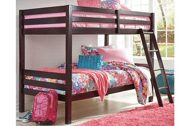 Save space and let kids rediscover sleep nestled in the classic style of the Halanton twin bunk bed. Beautifully finished in espresso color, this solidly made bed has protective horizontal rails with a fixed ladder for easy top bunk access. Mattresses sold separately.Made of solid wood | Includes horizontal rails | Top bunk with side rails | Sturdy ladder leads to top bunk | The Consumer Product Safety Commission states top bunks not be used for children under 6 years of age | Beds do not require foundations/box springs | This bunk bed can be converted into 2 separate beds; please see assembly instructions for details | Assembly required | Excluded from promotional discounts and coupons | Estimated Assembly Time: 60 Minutes