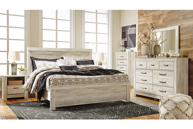 It’s gorgeous; its modern farmhouse; it’s the Bellaby king panel headboard. A wispy, whitewash hue sweeps over the replicated oak grain for that weathered, rustic look you crave. With classic panel styling and subtle timeworn charm, you’ll have a stylish countryside retreat to return to every night.Headboard only | Made of engineered wood (MDF/particleboard) and decorative laminate | Wispy white finish over replicated oak grain with authentic touch | Hardware not included | Four ¼" bolts are needed to attach headboard to existing bed frame | Bolt length depends on thickness of your bed frame | Foundation/box spring required; sold separately | Mattress available; sold separately | Assembly required
