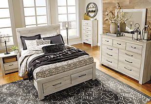 It’s gorgeous; its modern farmhouse; it’s the Bellaby panel headboard. A wispy, whitewash hue sweeps over the replicated oak grain for that weathered, rustic look you crave. With classic panel styling and subtle timeworn charm, you’ll have a stylish countryside retreat to return to every night.Headboard only | Made of engineered wood (MDF/particleboard) and decorative laminate | Wispy white finish over replicated oak grain with authentic touch | Hardware not included | Four ¼" bolts are needed to attach headboard to existing bed frame | Bolt length depends on thickness of your bed frame | Foundation/box spring required; sold separately | Mattress available; sold separately | Assembly required