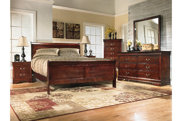 The Alisdair 5-piece bedroom set is the epitome of traditional decor. Louis Philippe-style moulding dates back to the mid-19th century when furnishings were lavish yet somewhat simple. Rich, complex finish is sure to grace your space with warmth and elegance. Includes king sleigh bed with picture frame panels and a pair of nightstands, each with two drawers and antiqued pulls. Mattress and foundation/box spring available, sold separately.Includes king headboard, footboard, rails and 2 nightstands | Bed made of veneers, wood and engineered wood; nightstand made of engineered wood | Louis Philippe-style moulding | Nightstand with 2 smooth-gliding drawers and antique bronze-tone hardware | Bed assembly required | Foundation/box spring required, sold separately | Mattress available, sold separately | Estimated Assembly Time: 5 Minutes