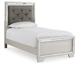 Taking its cues from Hollywood Regency interiors, the Lonnix twin upholstered bed is puttin’ on the ritz in a big way. The bed’s ultra-clean profile is elevated with a spectacular metallic silvertone finish, enriched with a hint of embossed texturing on the low-profile footboard. Tufted headboard is adorned with a low-maintenance gray faux leather fabric that’s as plush as it is practical. And for a dazzling effect: beveled mirror trim surrounding the upholstered cushion that’s brought to life by a string of LED lighting. Mattress and foundation/box spring available, sold separately.Made of wood and engineered wood | Includes headboard, footboard and rails | Silvertone metallic finish | Button-tufted faux leather upholstery  | LED backlights for ambiance | Power cord included; UL Listed | Beveled mirror trim | Embossed, textural panels | Assembly required | Mattress and foundation/box spring available, sold separately | Estimated Assembly Time: 55 Minutes