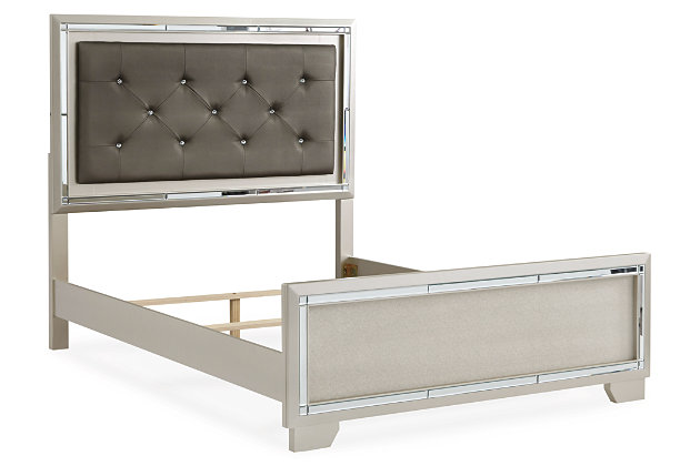 Taking its cues from Hollywood Regency interiors, the Lonnix full upholstered bed is puttin’ on the ritz in a big way. The bed’s ultra-clean profile is elevated with a spectacular metallic silvertone finish, enriched with a hint of embossed texturing on the low-profile footboard. Tufted headboard is adorned with a low-maintenance gray faux leather fabric that’s as plush as it is practical. And for a dazzling effect: beveled mirror trim surrounding the upholstered cushion that’s brought to life by a string of LED lighting. Mattress and foundation/box spring available, sold separately.Made of wood and engineered wood | Includes headboard, footboard and rails | Silvertone metallic finish | Button-tufted faux leather upholstery  | LED backlighting | Power cord included; UL Listed | Beveled mirror trim | Embossed, textural panels | Assembly required | Mattress and foundation/box spring available, sold separately | Estimated Assembly Time: 55 Minutes