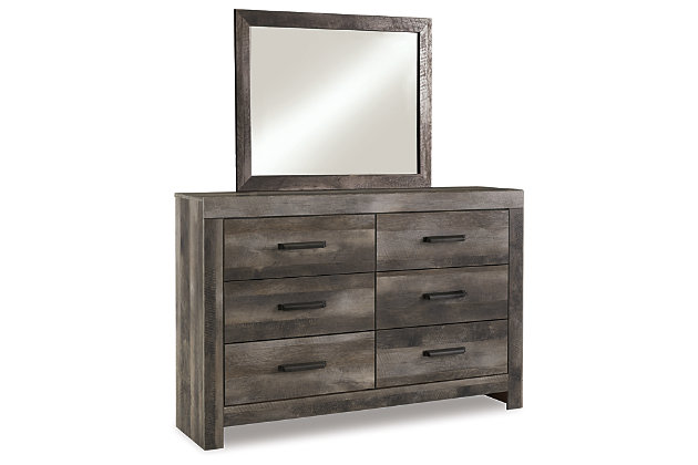 The Wynnlow dresser and mirror set is sure to win your heart with its daring designer take on modern rustic. The dresser and mirror's crisp, clean and minimalist-chic profile is enriched with a striking replicated oak grain with thick plank styling and a weathered gray finish for that much more authentic character. Large-scale hooded pulls gracing the flush-mount drawers add such a distinctive twist.Includes dresser and mirror | Made of engineered wood (MDF/particleboard) and decorative laminate | Rustic gray planked replicated oak grain with authentic touch | Hooded pull hardware in dark finish | 6 smooth-gliding drawers | Mirror attaches to back of dresser | Safety is a top priority, clothing storage units are designed to meet the most current standard for stability, ASTM F 2057 (ASTM International) | Drawers extend out to accommodate maximum access to drawer interior while maintaining safety | Assembly required | Estimated Assembly Time: 5 Minutes