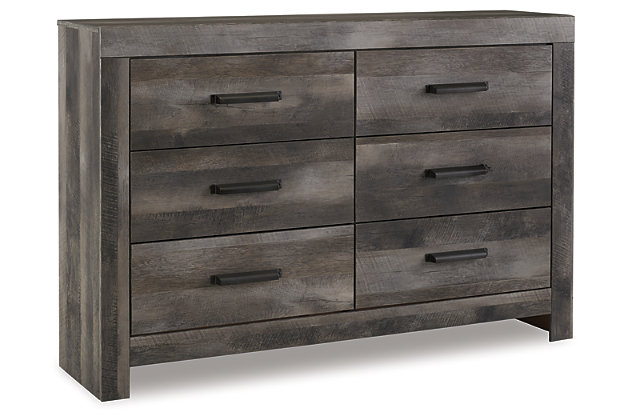 The Wynnlow dresser is sure to win your heart with its daring, designer take on modern rustic. The dresser’s crisp, clean and minimalist-chic profile is enriched with a striking replicated oak grain with thick plank styling and a weathered gray finish for that much more authentic character. Large-scale hooded pulls gracing the flush-mount drawers add such a distinctive twist.Dresser only | Made of engineered wood and decorative laminate | Rustic gray planked replicated oak grain with authentic touch | Hooded pull hardware in dark finish | 6 smooth-gliding drawers | Safety is a top priority, clothing storage units are designed to meet the most current standard for stability, ASTM F 2057 (ASTM International) | Drawers extend out to accommodate maximum access to drawer interior while maintaining safety | Assembly required