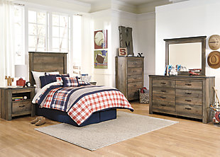 Whether she loves horses or he's a cowboy at heart, the Trinell twin panel headboard matches their authenticity. Rustic finish, plank-style details and nailhead trim pay homage to reclaimed barn wood, making for a chic look loaded with charm.Headboard only | Made of engineered wood (MDF/particleboard) and decorative laminate | Warm rustic plank finish over replicated oak grain and authentic touch | Nailhead accents | ¼” bolts (not included) are needed to attach headboard to existing bed frame | Bolt (not included) length depends on the thickness of your bed frame | Assembly required