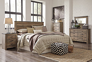The Trinell king panel headboard brings home a sense of authenticity. Rustic finish, plank-style details and nailhead trim pay homage to reclaimed barn wood, making for a chic look loaded with charm. Mattress available, sold separately.Headboard only | Made of engineered wood (MDF/particleboard) and decorative laminate | Warm rustic plank finish over replicated oak grain and authentic touch | Nailhead accents | ¼” bolts (not included) are needed to attach headboard to existing bed frame | Bolt (not included) length depends on the thickness of your bed frame | Assembly required