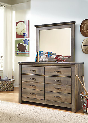 Whether she loves horses or he's a cowboy at heart, Trinell dresser and mirror matches their authentic sense of style. Rustic finish, plank details and nailhead trim are an homage to reclaimed barn wood, making for a sophisticated, vintage-chic look. Six roomy drawers keep clothing or toys nicely reined in.Includes dresser and mirror | Made of engineered wood (MDF/particleboard) and decorative laminate | Warm rustic plank finish over replicated oak grain and authentic touch | Antiqued bronze-tone hardware | 6 smooth-operating drawers | Mirror attaches to back of dresser | Safety is a top priority, clothing storage units are designed to meet the most current standard for stability, ASTM F 2057 (ASTM International) | Drawers extend out to accommodate maximum access to drawer interior while maintaining safety | Assembly required | Estimated Assembly Time: 5 Minutes