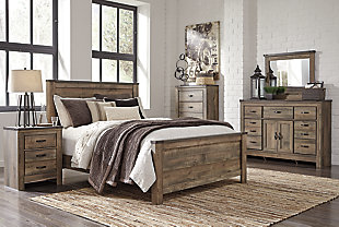 If you love country living, the Trinell queen panel bed matches your authenticity. Rustic finish, plank-style details and nailhead trim pay homage to reclaimed barn wood, making for a chic look loaded with charm. Mattress and foundation/box spring available, sold separately.Includes headboard, footboard and rails | Made of engineered wood and decorative laminate | Warm rustic plank finish over replicated oak grain and authentic touch | Nailhead accents | Foundation/box spring required, sold separately | Mattress available, sold separately | Assembly required | Estimated Assembly Time: 10 Minutes