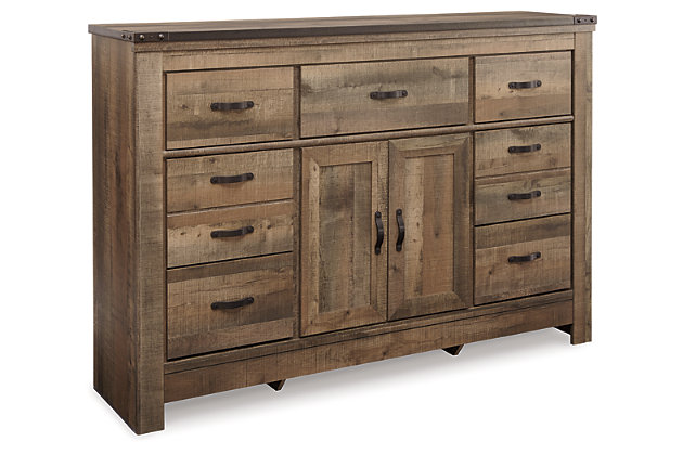 The Trinell dresser with fireplace option makes home on the range look so alluring. The aesthetic is earthy yet clean and sophisticated, with a rustic finish, plank-style details and nailhead trim that pay homage to reclaimed barn wood. Opt for the optional LED fireplace for instant warmth and romance.Dresser only | Made of engineered wood (MDF/particleboard) and decorative laminate | Warm rustic plank finish over replicated oak grain and authentic touch | Antiqued bronze-tone hardware | 7 smooth-operating drawers | Adjustable shelf behind cabinet doors | Compatible with W100-101 and W100-02 electric fireplace inserts | Safety is a top priority, clothing storage units are designed to meet the most current standard for stability, ASTM F 2057 (ASTM International) | Drawers extend out to accommodate maximum access to drawer interior while maintaining safety | Assembly required