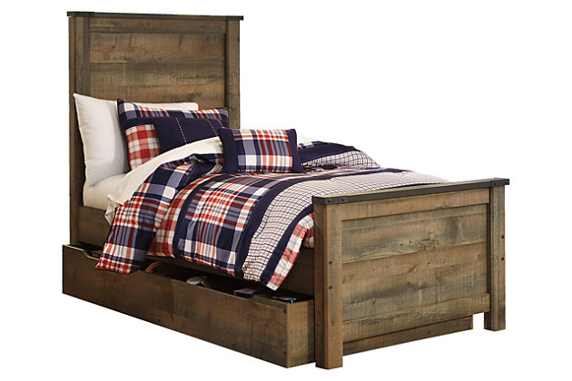 If you love country living, the Trinell twin panel bed with storage matches your authenticity. Rustic finish, plank-style details and nailhead trim pay homage to reclaimed barn wood, making for a chic look loaded with charm. Under bed storage unit includes two dividers to accommodate everything from toys and games to books and bedding. Mattress and foundation/box spring available, sold separately.Includes headboard, footboard, under bed storage and rails | Made of engineered wood and decorative laminate | Warm rustic plank finish over replicated oak grain and authentic touch | Wheeled under bed storage unit with 2 dividers | Nailhead accents | Foundation/box spring required, sold separately | Mattress available, sold separately | Assembly required | Estimated Assembly Time: 35 Minutes