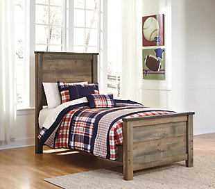 Whether she loves horses or he's a cowboy at heart, the Trinell twin panel headboard matches their authenticity. Rustic finish, plank-style details and nailhead trim pay homage to reclaimed barn wood, making for a chic look loaded with charm.Headboard only | Made of engineered wood (MDF/particleboard) and decorative laminate | Warm rustic plank finish over replicated oak grain and authentic touch | Nailhead accents | ¼” bolts (not included) are needed to attach headboard to existing bed frame | Bolt (not included) length depends on the thickness of your bed frame | Assembly required