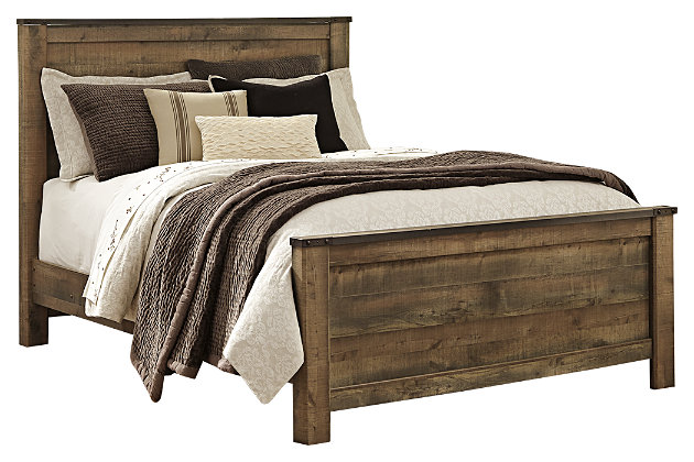If you love country living, the Trinell queen panel bed matches your authenticity. Rustic finish, plank-style details and nailhead trim pay homage to reclaimed barn wood, making for a chic look loaded with charm. Mattress and foundation/box spring available, sold separately.Includes headboard, footboard and rails | Made of engineered wood and decorative laminate | Warm rustic plank finish over replicated oak grain and authentic touch | Nailhead accents | Foundation/box spring required, sold separately | Mattress available, sold separately | Assembly required | Estimated Assembly Time: 10 Minutes