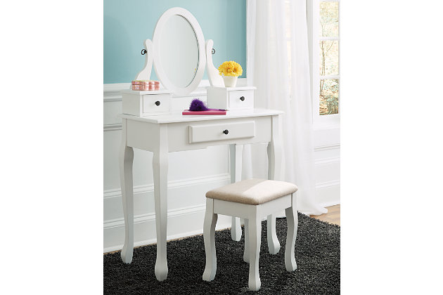 Let her country cottage style shine through with the crisp and cheerful Kaslyn vanity set. Enchanting elements include graceful cabriole legs, a swivel mirror and a bright, white finish. The spacious top offers plenty of room to display perfume bottles and more. She'll love the assortment of drawers that keep her small essentials out of the way.Made of wood and engineered wood | Antiqued pewter-tone hardware | 1 smooth-operating drawer, 2 accessory drawers | Stool with woven polyester upholstery | Oval swivel mirror | Estimated Assembly Time: 30 Minutes