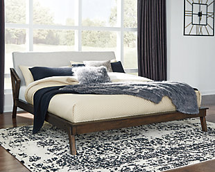 If you’re longing for just the right blend of high-style contemporary and mid-century minimalism, the Kisper queen platform bed with upholstered headboard rises to the occasion. Covered in a gorgeous graphite-tone fabric, the slanted padded headboard offers a luxurious backrest for watching TV or catching up on bedtime reads. Mattress available, sold separately.Includes upholstered headboard, platform footboard, rails and roll slats | Made of wood, veneers and engineered wood | Brushed dry-brown wood finish | Polyester upholstery | Included slats eliminate the need for foundation/box spring | Mattress available, sold separately | Assembly required | Estimated Assembly Time: 65 Minutes