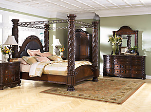 Inspired by the grandeur and grace of Old World traditional style, the North Shore dresser and mirror set is nothing short of stunning. A choice blend of materials is accented by detailed ornamental appliques. A marble parquetry top completes the opulent look. Nine smooth-gliding drawers serve your storage needs exceptionally well.Made of veneers, wood, engineered wood, cast resin and marble parquetry | Antique goldtone hardware | Faux keyhole | Serpentine-shaped drawer fronts | Top drawers with felt bottoms | 9 drawers | Mirror attaches to back of dresser | Assembly required | Inlaid marble top | Includes tipover restraint device | Estimated Assembly Time: 5 Minutes