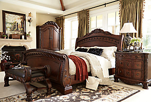 Inspired by the grandeur and grace of Old World traditional style, the North Shore sleigh bed is nothing short of stunning. A choice blend of materials is accented by detailed ornamental appliques. Graceful curves of the sleigh design are the essence of romance. Mattress and foundation/box spring sold separately.Made of veneers, wood, engineered wood and cast resin | Includes headboard, footboard and rails | Assembly required | Foundation/box spring required, sold separately | Mattress available, sold separately | Estimated Assembly Time: 10 Minutes