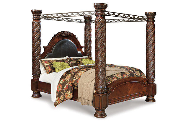 Inspired by the grandeur and grace of Old World traditional style, the North Shore canopy bed is nothing short of stunning. A choice blend of materials is accented by detailed ornamental appliques. -scale decorative pilasters and a sweeping canopy make a grand stance. Mattress and foundation/box spring sold separately.Made of veneers, wood, manmade wood and cast resin | Includes headboard, footboard, posts, canopy and rails | Headboard with faux leather upholstery | Assembly required | Measure room, including ceiling height to ensure bed clears fans and light fixtures