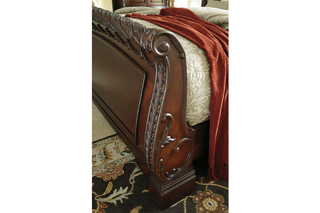 Inspired by the grandeur and grace of Old World traditional style, the North Shore queen sleigh bed is nothing short of stunning. A choice blend of materials is accented by detailed ornamental appliques. Graceful curves of the sleigh design are the essence of romance. Mattress and foundation/box spring sold separately.Made of veneers, wood, engineered wood and cast resin | Includes headboard, footboard and rails | Assembly required | Foundation/box spring required, sold separately | Mattress available, sold separately | Estimated Assembly Time: 10 Minutes