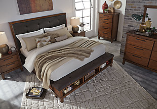 With a clean-lined, blocky profile and open front built-in bench, the richly upholstered Ralene queen storage bed offers an indulgent take on minimalist design. Extending far beyond the high tufted headboard, its thickly padded upholstery graces the rails and footboard storage bench for comfort from head to toe. Mattress and foundation/box spring available, sold separately.Made of veneers, wood and engineered wood | Includes headboard, footboard and rails | Polyester upholstered headboard, rails and footboard storage bench | Assembly required | Small Space Solution | Foundation/box spring required, sold separately | Mattress available, sold separately | Estimated Assembly Time: 85 Minutes