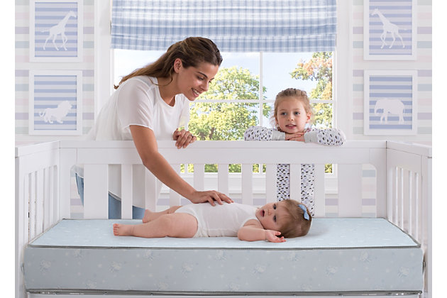 Sweet dreams for baby begin with this oh-so comfortable crib and toddler bed mattress. The sophisticated support system features thermo-bonded polyester at the core to offer long-lasting firmness and durability for your little one from infancy to toddlerhood, catering to baby’s growth. Its lightweight design enables easier changing, while square corners ensure a snug and secure fit inside the crib or toddler bed frame. Finally, the waterproof, vinyl cover repels wetness to help keep baby dry and comfy all night long.Comfort level: firm | Thermo-bonded polyester fiber foam core | Thick firm support foam | Durable, waterproof vinyl cover | Lightweight for easy changing | Square corners ensure secure fit inside crib or toddler bed frame | 5-year limited warranty | For any questions regarding Delta Children products, please contact consumersupport@deltachildren.com Monday to Friday, 8:30 a.m. to 6 p.m. (EST)