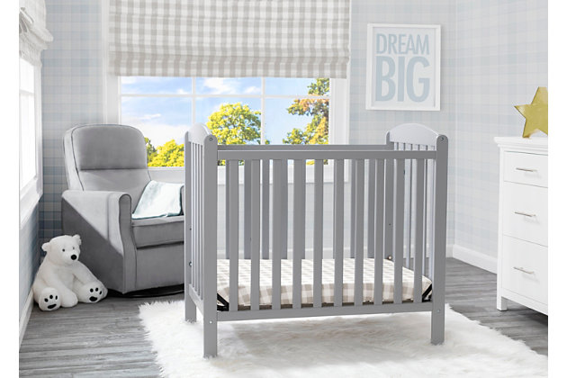 Wor with limited square footage? No problem. This Mini Convertible Baby Crib with Mattress from Delta Children delivers the same versatility and style as a -size crib, just in a scaled-down size. but mighty, this crib features a two-position mattress support that can be lowered as your baby grows, plus it easily converts into a bed when your child is ready ( bed frame not included, sold separately). Arched panels on both ends of the crib add charm and make it a great option in nurseries or grandma’s house. Includes mini-crib mattress.For any questions regarding delta children products, please contact consumersupport@deltachildren.com monday to friday, 8:30 a.m. To 6 p.m. (est) | Made of wood, engineered wood and metal | Converts to a headboard (bed frame not included, sold separately) | Pair this crib with any delta children pieces in matching colors to complete your baby's nursery | Adjustable height mattress support with 2 convenient positions to grow with your baby | Assembly required