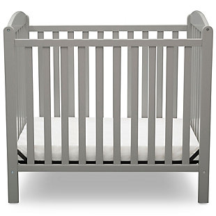 Wor with limited square footage? No problem. This Mini Convertible Baby Crib with Mattress from Delta Children delivers the same versatility and style as a -size crib, just in a scaled-down size. but mighty, this crib features a two-position mattress support that can be lowered as your baby grows, plus it easily converts into a bed when your child is ready ( bed frame not included, sold separately). Arched panels on both ends of the crib add charm and make it a great option in nurseries or grandma’s house. Includes mini-crib mattress.For any questions regarding delta children products, please contact consumersupport@deltachildren.com monday to friday, 8:30 a.m. To 6 p.m. (est) | Made of wood, engineered wood and metal | Converts to a headboard (bed frame not included, sold separately) | Pair this crib with any delta children pieces in matching colors to complete your baby's nursery | Adjustable height mattress support with 2 convenient positions to grow with your baby | Assembly required