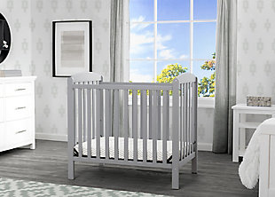 Working with limited square footage? No problem. This Mini Convertible Baby Crib with Mattress from Delta Children delivers the same versatility and style as a full-size crib, just in a scaled-down size. Small but mighty, this crib features a two-position mattress support that can be lowered as your baby grows, plus it easily converts into a twin bed when your child is ready (twin bed frame not included, sold separately). Arched panels on both ends of the crib add charm and make it a great option in small nurseries or grandma’s house. Includes mini-crib mattress.For any questions regarding delta children products, please contact consumersupport@deltachildren.com monday to friday, 8:30 a.m. To 6 p.m. (est) | Made of wood, engineered wood and metal | Converts to a twin headboard (bed frame not included, sold separately) | Pair this crib with any delta children pieces in matching colors to complete your baby's nursery | Adjustable height mattress support with 2 convenient positions to grow with your baby | Assembly required