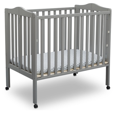 gray mini crib