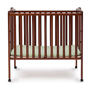 Great for small spaces or as a travel crib, the Portable Folding Crib with Mattress from Delta Children delivers the same versatility and style as a full-size crib, just in a scaled-down size. Its rolling casters allow for easy movement throughout the home, so you can keep your baby nearby at all times. When you’re on the go, it’s easier than ever to provide a safe and comfy sleep space for your little one. Made from durable wood, it folds easily making it perfect for transport. Designed for convenience, the Portable Folding Crib with Mattress from Delta Children includes everything needed for a good night's sleep. Includes mini-crib mattress.For any questions regarding delta children products, please contact consumersupport@deltachildren.com monday to friday, 8:30 a.m. To 6 p.m. (est) | Made of wood, engineered wood and metal | Includes a 2.75" thick mini-crib mattress, uses 24"x 38" crib sheets (sold separately) | Assembly required