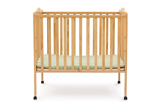 Great for spaces or as a travel crib, the Portable Folding Crib with Mattress from Delta Children delivers the same versatility and style as a -size crib, just in a scaled-down size. Its rolling casters allow for easy movement throughout the home, so you can keep your baby nearby at all times. When you’re on the go, it’s easier than ever to provide a safe and comfy sleep space for your little one. Made from durable wood, it folds easily ma it perfect for transport. Designed for convenience, the Portable Folding Crib with Mattress from Delta Children includes everything needed for a good night's sleep. Includes mini-crib mattress.For any questions regarding delta children products, please contact consumersupport@deltachildren.com monday to friday, 8:30 a.m. To 6 p.m. (est) | Made of wood, engineered wood and metal | Includes a 2.75" thick mini-crib mattress, uses 24"x 38" crib sheets (sold separately) | Assembly required