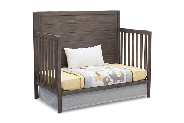 The Cambridge 4-in-1 Convertible Crib from Delta Children helps make your baby’s nursery a true expression of your style. This baby crib showcases clean lines and a distressed, textured finish that comes together to create the perfect yin and yang between rugged and refined. A one-of-a-kind option for your little one, the Cambridge 4-in-1 Convertible Crib is designed with a solid headboard that’s accented with shiplap-inspired horizontal planks that instantly bring warmth and character to any baby’s room.  A welcome spot for sweet dreams for years to come, this crib allows you to easily lower the mattress support to any of the three height levels to accommodate your child as they begin to sit or stand. And to make sure it’s the only bed your child will need in their lifetime, it easily adapts from a crib to a toddler bed, a daybed and a full-size bed (Daybed Rail included; Toddler Guardrail and Full Size Metal Bed Frame sold separately).For any questions regarding delta children products, please contact consumersupport@deltachildren.com monday to friday, 8:30 a.m. To 6 p.m. (est) | Made of wood, engineered wood and metal | Converts from crib to: toddler bed, daybed and full-size bed (daybed rail included; toddler guardrail &amp; full-size bed rails sold separately) | Adjustable height mattress support with 3 convenient positions to grow with your baby | Fits standard size crib mattress (sold separately) | Assembly required