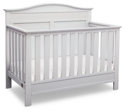 white crib with wood trim