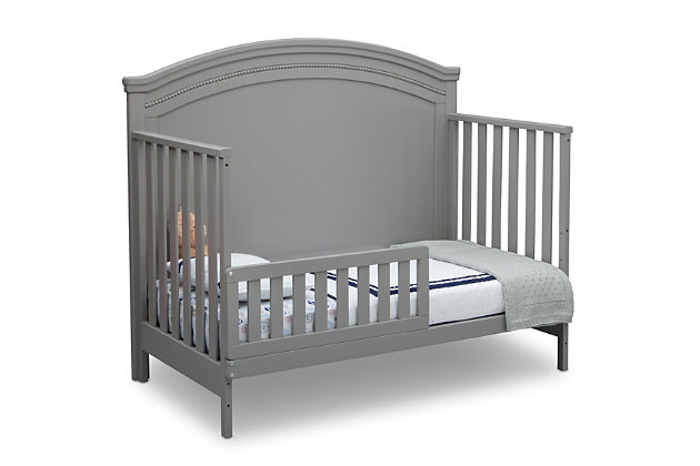 Nothing can compare to the enduring elegance of the Emma Crib ‘N’ More from Simmons Kids. Classic architectural detailing, bead and crown molding, as well as a solid, bell-shaped headboard provide a sophisticated foundation that stands the test of time. An heirloom-quality piece, this crib easily grows alongside baby with its three mattress heights that allow you to lower it as your child matures. Plus, once your little one has outgrown the need for a crib, it converts into a toddler bed, daybed and full-size bed.For any questions regarding delta children products, please contact consumersupport@deltachildren.com monday to friday, 8:30 a.m. To 6 p.m. (est) | Made of wood, engineered wood and metal | Converts from crib to: toddler bed, daybed and full-size bed (daybed rail included; toddler guardrail &amp; full-size bed rails sold separately) | Adjustable height mattress support with 3 convenient positions to grow with your baby | Fits standard size crib mattress (sold separately) | Assembly required
