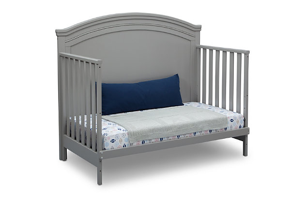Nothing can compare to the enduring elegance of the Emma Crib ‘N’ More from Simmons Kids. Classic architectural detailing, bead and crown molding, as well as a solid, bell-shaped headboard provide a sophisticated foundation that stands the test of time. An heirloom-quality piece, this crib easily grows alongside baby with its three mattress heights that allow you to lower it as your child matures. Plus, once your little one has outgrown the need for a crib, it converts into a toddler bed, daybed and full-size bed.For any questions regarding delta children products, please contact consumersupport@deltachildren.com monday to friday, 8:30 a.m. To 6 p.m. (est) | Made of wood, engineered wood and metal | Converts from crib to: toddler bed, daybed and full-size bed (daybed rail included; toddler guardrail &amp; full-size bed rails sold separately) | Adjustable height mattress support with 3 convenient positions to grow with your baby | Fits standard size crib mattress (sold separately) | Assembly required