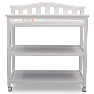 The Bell Top Changing Table with Wheels from Delta Children grants you the freedom to easily change and dress your baby. A convenient changing station, this versatile table has a bell-shaped back with slated detailing and a streamlined profile that effortlessly pairs with any item. Outfitted with two fixed shelves to conveniently store your child's essential items, the Bell Top Changing Table also features four casters on the bottom, so you can roll the table from one end of the room to the other. For your baby’s safety, the included changing pad with safety strap keeps your little one secure—even when they won’t stay still.For any questions regarding delta children products, please contact consumersupport@deltachildren.com monday to friday, 8:30 a.m. To 6 p.m. (est) | Made of wood, engineered wood and metal | Strong and sturdy wood construction | Includes two fixed shelves for open storage | Changing pad with safety strap included | Assembly required