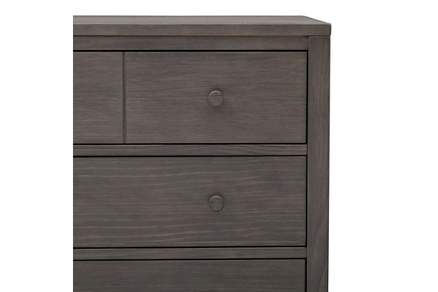 The rustic, extra-roomy Cambridge 3 Drawer Dresser Set from Delta Children features a unique textured finish that allows the deep grain of the wood to show through. Built to last, it has a smooth metal glide system with safety stops that prevents drawers from pulling out, making it easy and safe for kids to manage on their own. Add additional functionality to your dresser with the Cambridge Changing Top. The Changing Top securely attaches to the dresser, offering a dedicated space for changing or dressing your baby. Once your child has outgrown the need for a changing table, the top can easily be removed. Changing pad required (sold separately).Includes Cambridge 3 Drawer Dresser and Cambridge Changing Top | Made of wood, engineered wood and metal | Top drawer features a double drawer front that opens to reveal one spacious drawer | 3 spacious drawers feature metal drawer guides with safety stops | Solid wood changing top securely mounts to the dresser, removes easily | Requires a 34" x 16" x 1" changing pad (sold separately) | Assembly required | For any questions regarding Delta Children products, please contact consumersupport@deltachildren.com. Monday to Friday, 8:30 a.m. to 6 p.m. (EST)