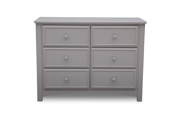 This 6 Drawer Dresser Set from Delta Children is as pretty as it is practical. Featuring six spacious drawers with wooden knobs, this strong and sturdy piece is built to last. The dresser drawers are equipped with a ball-bearing glide system, making it easy for kids to manage on their own. Extra features that ensure your child’s well-being include safety stops that prevent the drawers from falling out, as well as an included anti-tip kit. Add additional functionality to your dresser with the Delta Changing Top. The Changing Top securely attaches to the dresser, offering a dedicated space for changing or dressing your baby. Once your child has outgrown the need for a changing table, the top can easily be removed. Changing pad required (sold separately).Includes Delta 6 Drawer Dresser and Changing Top | Made of wood, engineered wood and metal | Top drawer features a double drawer front that opens to reveal one spacious drawer | 6 smooth gliding drawers with ball-bearing construction and safety stops | Solid wood changing top securely mounts to the dresser, removes easily | Requires a 34" x 16" x 1" changing pad (sold separately)s | Anti-tip kit included | Assembly required | For any questions regarding Delta Children products, please contact consumersupport@deltachildren.com. Monday to Friday, 8:30 a.m. to 6 p.m. (EST)