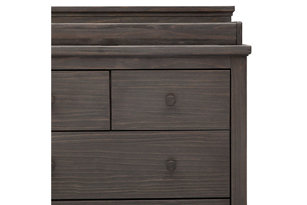 Impressive and substantial, the Paloma 4 Drawer Dresser with Changing Top from Simmons Kids instantly brings warmth to any space. Gorgeously made from strong and sturdy pine, this dresser features a hand-distressed, soft textured finish that makes each piece one of a kind. Built to accommodate your child’s needs, this rustic dresser features a removable changing topper, plus it has two large drawers and two smaller drawers to house all their clothes and accessories. Pair it with the Paloma 4-in-1 Convertible Crib (sold separately) to complete your nursery. Due to varying wood grains and variations in the hand-applied finish, product might appear slightly different than those shown on site.For any questions regarding delta children products, please contact consumersupport@deltachildren.com monday to friday, 8:30 a.m. To 6 p.m. (est) | Made of wood, engineered wood and metal | 4 drawers | Includes removable changing top (changing pad sold separately) | Assembly required