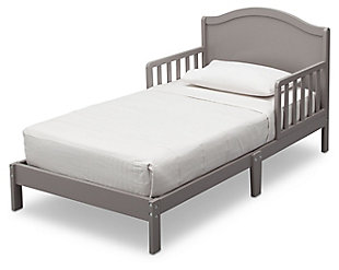 Sweet dreams are made of this. Merging a clean profile with cozy comfort, this toddler bed is high style, sized accordingly. Designed to give them the “big kid” bed they crave while including a few modifications to put you at ease, this bed will have everyone resting easy. Low to the ground profile makes it easy for your little one to get in and out of bed on their own, while the attached guardrails are both pretty and practical. Best of all, your existing full-size crib mattress (sold separately) will fit this toddler bed to a T.For any questions regarding delta children products, please contact consumersupport@deltachildren.com monday to friday, 8:30 a.m. To 6 p.m. (est) | Made of wood | Gray finish | Transitional design | Fits full-size crib mattress; sold separately | Low profile with guardrails on each side | Assembly required