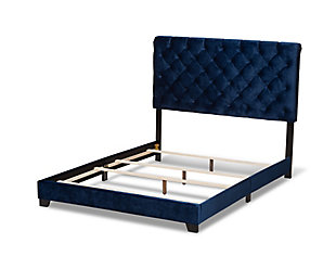 Create the high-glam bedroom of your dreams with this sumptuously upholstered bed. Indulgent blue velvet fabric is enriched with button tufting and chrome-tone nailhead trim for a high-end look that’s so comfortably priced.Made of wood and engineered wood | Velvet polyester upholstery over foam cushioned headboard | Headboard with button tufting and chrome-tone nailhead trim | Assembly required | Assembly required | Foundation/box spring required, sold separately | Mattress available, sold separately