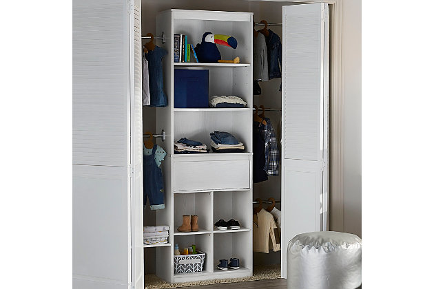 Making the most of limited closet space, this quality-built Grow with Me closet insert provides plenty of storage to keep your child’s clothes organized and within reach. Its high-end designer aesthetic has a staying power you’re sure to love. What a brilliant choice—everywhere from the nursery to a tween or teen’s room.Made of engineered wood/laminated particle board | Non-toxic white finish | 5 adjustable metal clothes rods | 3 shelves (1 adjustable) | 4 open cubbies | Smooth-gliding drawer with metal slides | Shoe rack (attachable on either side) | Anti-tip kit included for extra protection | 1-year limited warranty | Assembly required