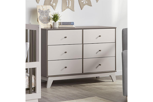 Just because they’re outgrowing their clothes doesn’t mean they should outgrow their bedroom furniture. Offering a cool, crisp, modern look, the quality-built Little Seeds Rowan Valley Flint 6-drawer dresser has a sense of staying power you’re sure to love. What a sophisticated choice that’s welcome everywhere from the nursery to a tween or teen’s room.Made of engineered wood/laminated particle board | Non-toxic, two-tone (gray and brown) finish | 6 smooth-gliding drawers with metal slides | Changing table topper available (sold separately) | Anti-tip kit included for extra protection | Assembly required