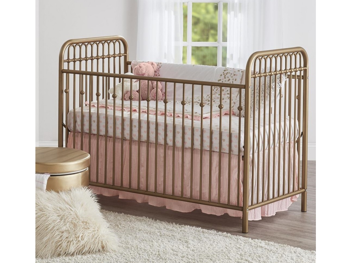 Gold metal crib store nursery