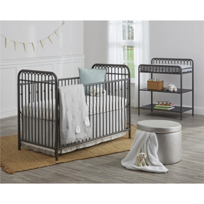 gray metal crib