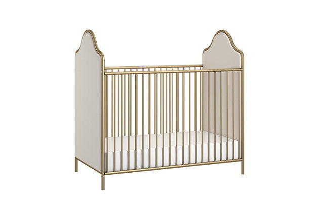 Create a prim and proper space for your little darling with the Little Seeds Piper Upholstered metal crib. The beautifully arched frame with upholstered panels speaks to turn-of-the-century sensibilities, and the mattress support adjusts to three different heights to give you function and style in one. Whether you want a modern take on antique style or have a period home, this soft look will grow with your little one.Made of metal and fabric | Nontoxic goldtone powder-coated finish on legs and frame with plush upholstered end panels | Crib fits a standard size crib mattress (not included) | Converts to toddler bed with the piper toddler rail conversion kit (sold separately) | Metal mattress support adjusts to 3 different heights as your child grows | Stability tested for 3 mattress heights as your child grows | Purchase supports the little seeds animal habitat initiative | Little seeds partners with the national wildlife federation’s garden for wildlife program to help save the monarch butterfly | Assembly required