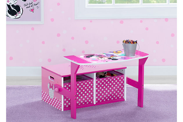 The Disney Minnie Mouse Kids Activity Bench by Delta Children is simply ear-resistible! Adorned with all things Minnie, including a polka dot print, bows and pretty pink hue, this charming bench is timeless—just like Minnie Mouse herself. An ideal choice for your growing Mouseketeer, it features a 3-in-1 design that easily converts from a storage bench to a desk, to offer easy transition from playtime to homework, crafts and more in seconds. An incredibly versatile piece, this bench/desk also features ample storage underneath with two fabric bins; it's a perfect spot for kids to keep their toys, books, art supplies or more. A smart and stylish addition to your little one’s Clubhouse, this sturdy activity bench will be cherished for years to come.For any questions regarding delta children products, please contact consumersupport@deltachildren.com monday to friday, 8:30 a.m. To 6 p.m. (est) | Made of wood, engineered wood, metal and fabric | 2 fabric storage bins | Recommended for ages 3 and up | Easy assembly