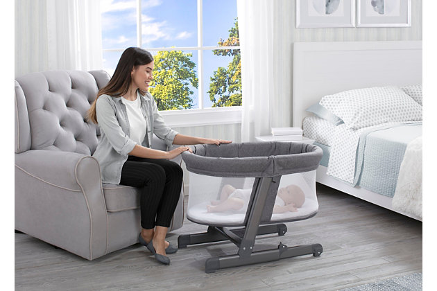 The Oval City Sleeper Bassinet from Simmons Kids is there for your baby as they grow. Making it extremely easy and safe to room share with your little one, this bassinet features multiple height levels allowing you to lower or raise the unit as needed. Raise it to one of the higher height levels and keep it near your bed so you can tend to your newborn at night. Lower it while seated so your baby can see you clearly. Slightly tilt the bassinet to engage the wheels that allow you to easily move it from room to room. The included quilted mattress pad offers a firm, comfortable surface to sleep on while mesh sides provide a clear view of baby and help air circulate. A must-have for new parents, this item helps relieve the stress of the first few months with your baby by providing a safe room-sharing option for your family.For any questions regarding delta children products, please contact consumersupport@deltachildren.com monday to friday, 8:30 a.m. To 6 p.m. (est) | Made of metal, plastic and fabric | 5 adjustable height positions | Mesh sides provide a clear view and help air circulate | Recommended for birth to 5 months | Holds up to 15 lbs. | Included quilted mattress pad cover is waterproof and machine washable
