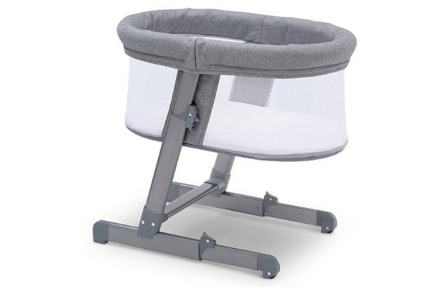 The Oval City Sleeper Bassinet from Simmons Kids is there for your baby as they grow. Making it extremely easy and safe to room share with your little one, this bassinet features multiple height levels allowing you to lower or raise the unit as needed. Raise it to one of the higher height levels and keep it near your bed so you can tend to your newborn at night. Lower it while seated so your baby can see you clearly. Slightly tilt the bassinet to engage the wheels that allow you to easily move it from room to room. The included quilted mattress pad offers a firm, comfortable surface to sleep on while mesh sides provide a clear view of baby and help air circulate. A must-have for new parents, this item helps relieve the stress of the first few months with your baby by providing a safe room-sharing option for your family.For any questions regarding delta children products, please contact consumersupport@deltachildren.com monday to friday, 8:30 a.m. To 6 p.m. (est) | Made of metal, plastic and fabric | 5 adjustable height positions | Mesh sides provide a clear view and help air circulate | Recommended for birth to 5 months | Holds up to 15 lbs. | Included quilted mattress pad cover is waterproof and machine washable